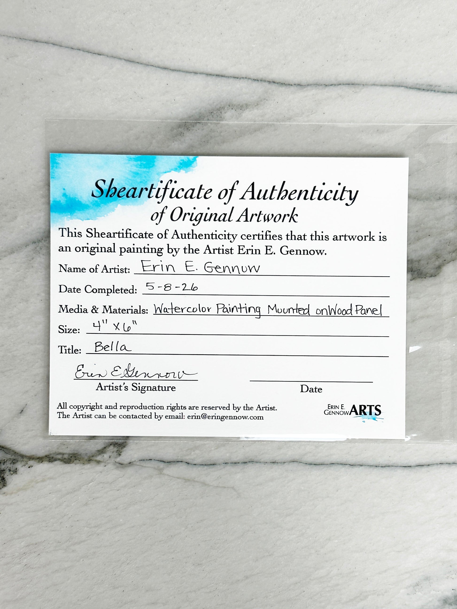 Shear-tificate of Authenticity included with Bella the Sheep, signed by artist Erin E. Gennow