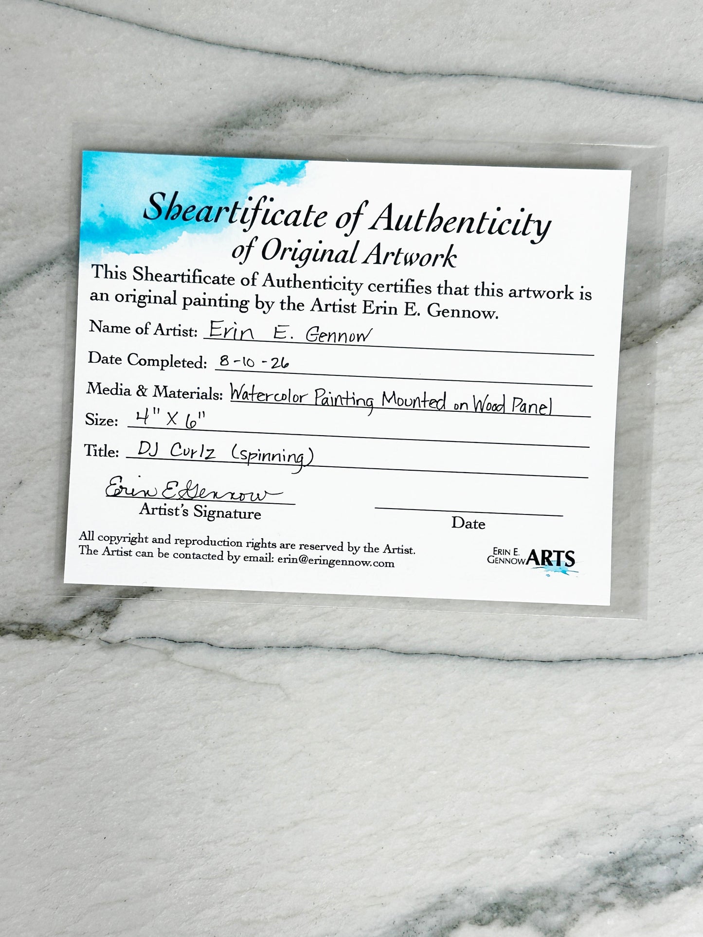 Shear-tificate of Authenticity included with DJ Curlz the Sheep, signed by artist Erin E. Gennow
