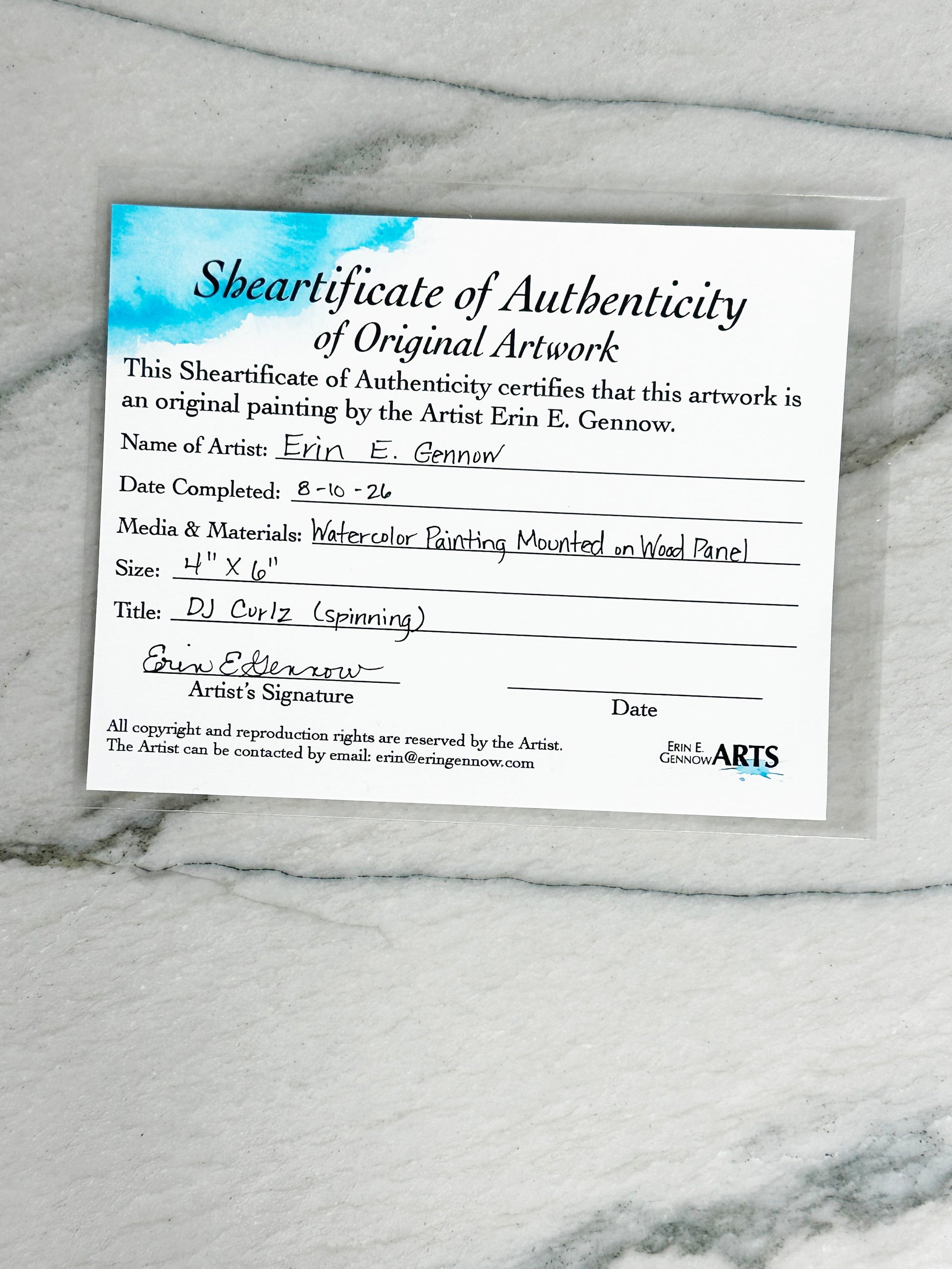 Shear-tificate of Authenticity included with DJ Curlz the Sheep, signed by artist Erin E. Gennow