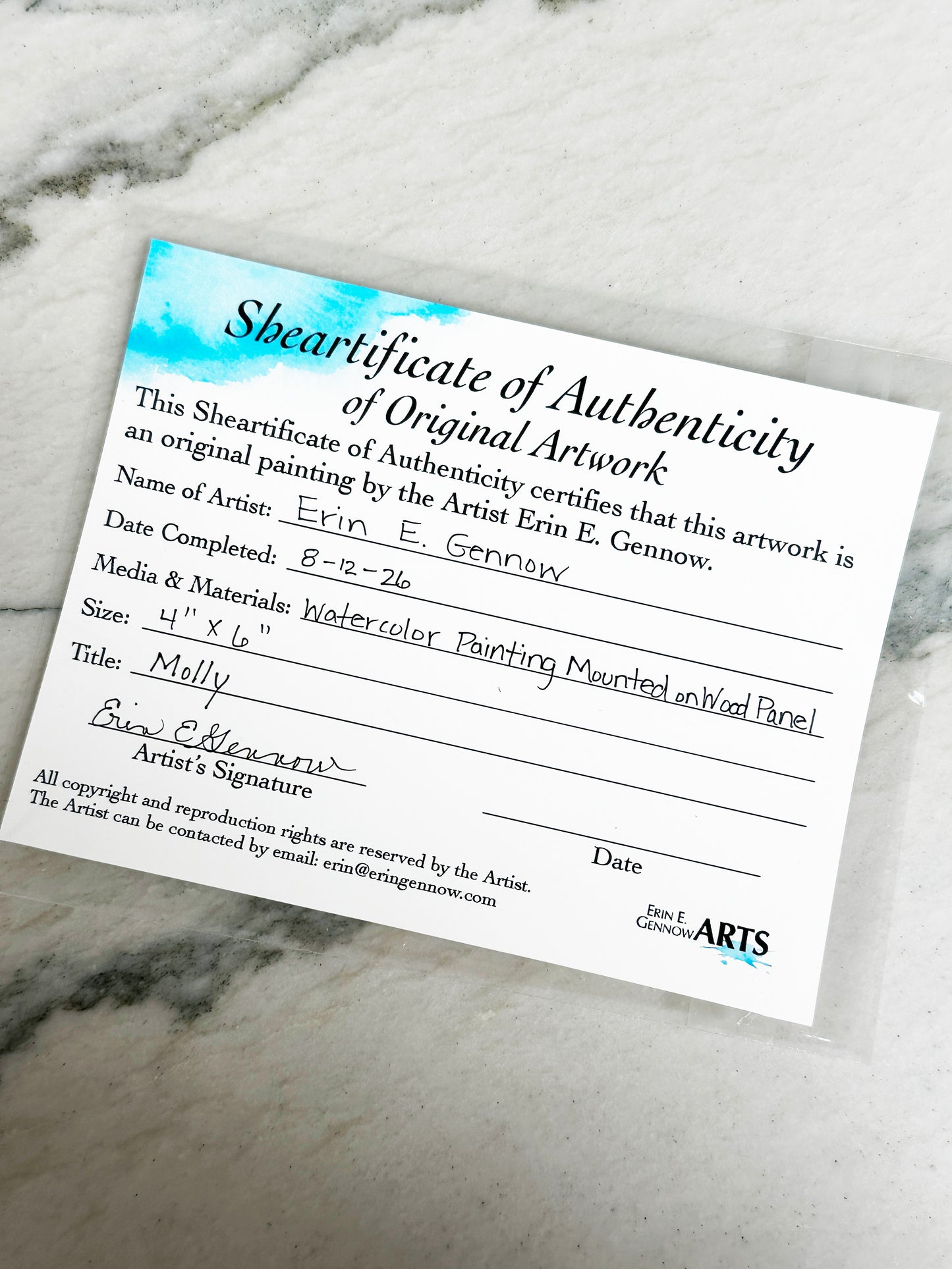 Shear-tificate of Authenticity included with Molly the Sheep, signed by artist Erin E. Gennow