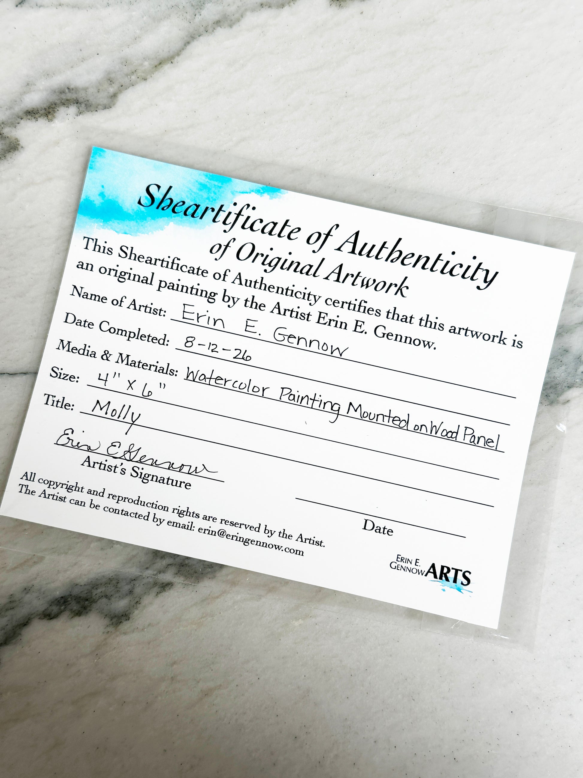 Shear-tificate of Authenticity included with Molly the Sheep, signed by artist Erin E. Gennow