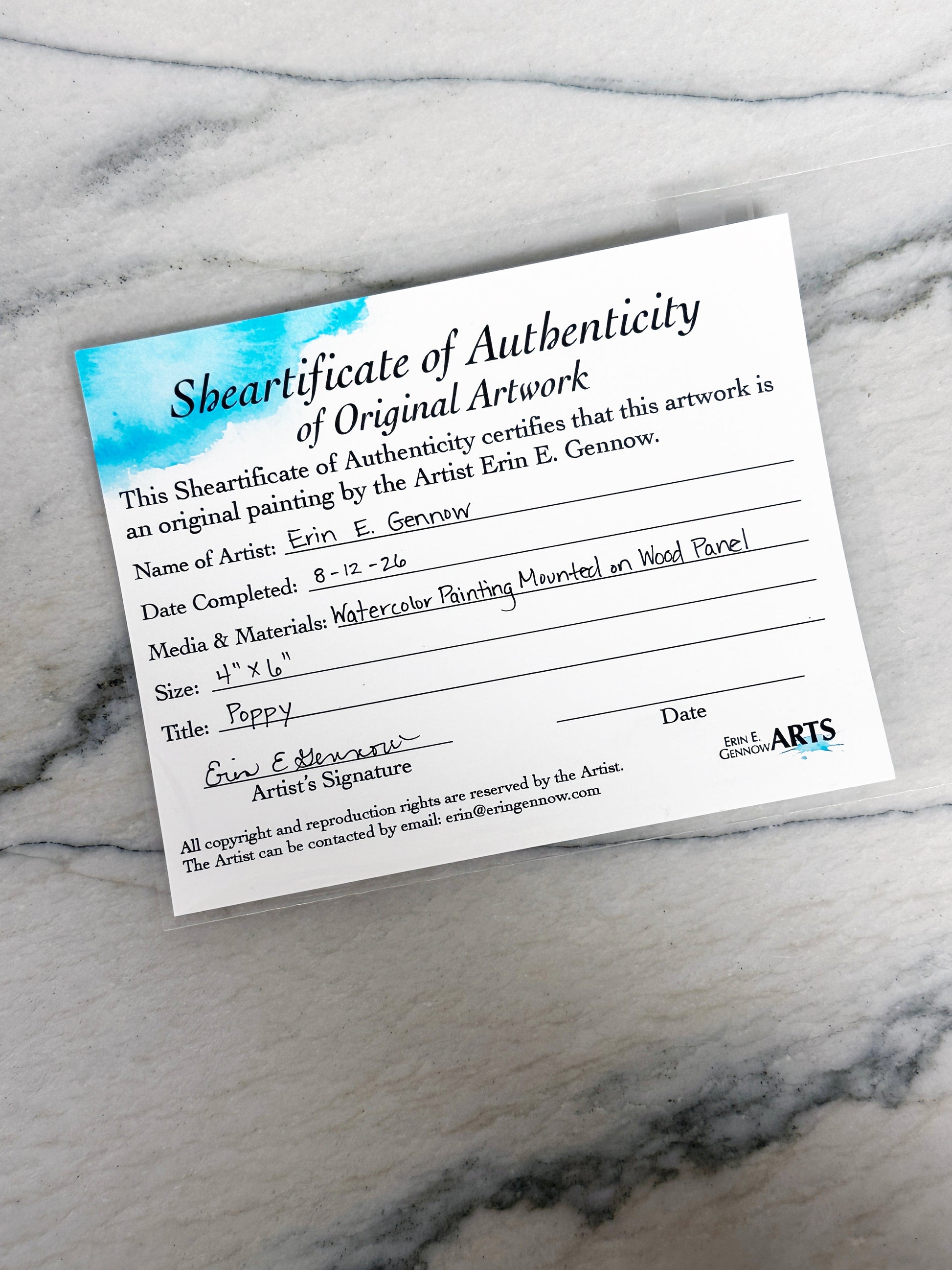 Shear-tificate of Authenticity included with Poppy the Sheep, signed by artist Erin E. Gennow